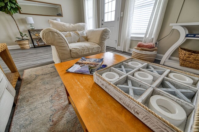 Building Photo - Updated coastal townhome- fully furnished!