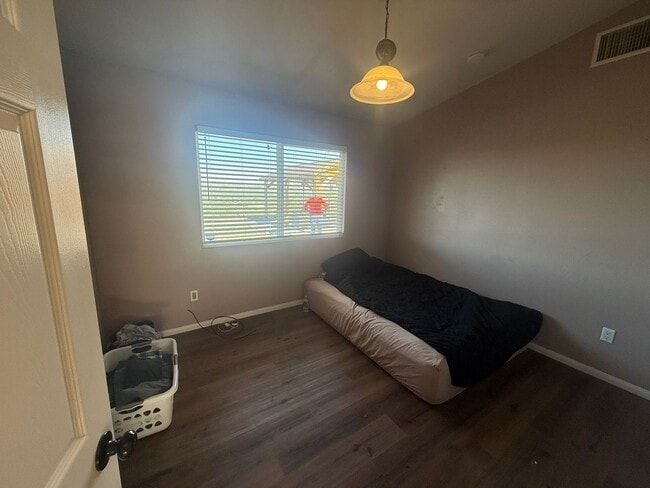 Building Photo - 4BR/2BA HOME w/ attached garage, usable land, fenced in back yard in CAMPO available!