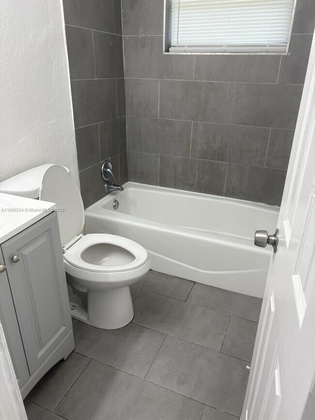 Building Photo - 2861 NW 15th Ct