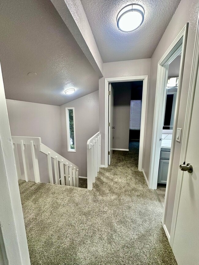 Building Photo - Charming & Spacious 3-Bedroom Duplex in the Heart of Highland!