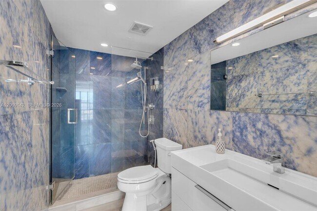 Building Photo - 5005 Collins Ave