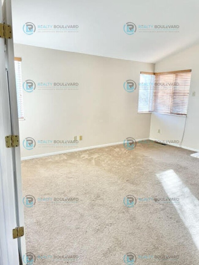 Building Photo - Well-Appointed 4BR Home with Open Floorplan & Expansive Yard