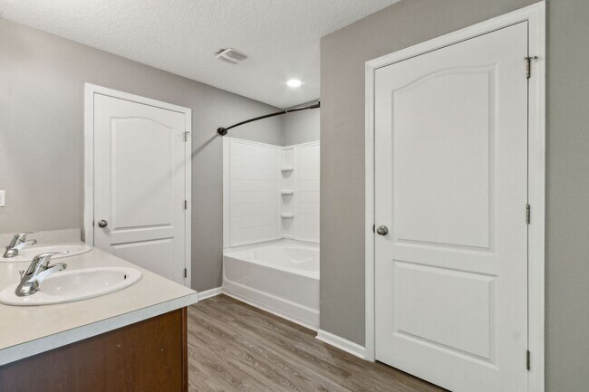 Building Photo - Spacious 5-Bedroom Home  – Prime Amelia Concourse Location!