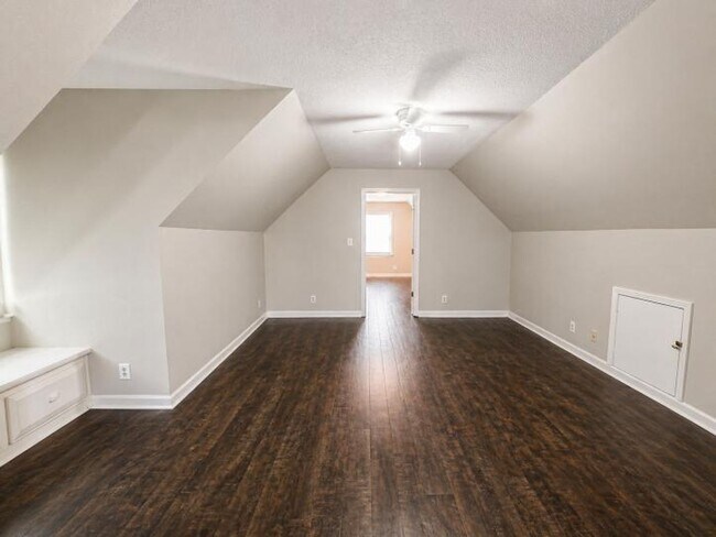 Building Photo - Welcome home to the perfect blend of peaceful country charm and modern city living!