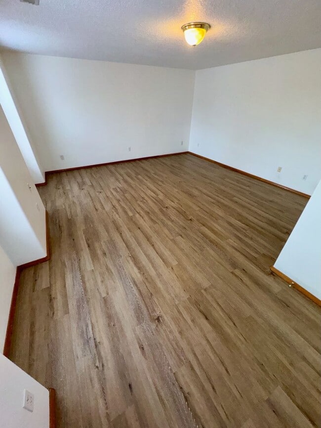 Building Photo - Spacious 4BR Home with Fenced Yard, 2-Car Garage & Convenient Location