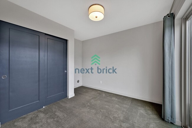 Building Photo - Sleek and Spacious Townhome with Gourmet K...