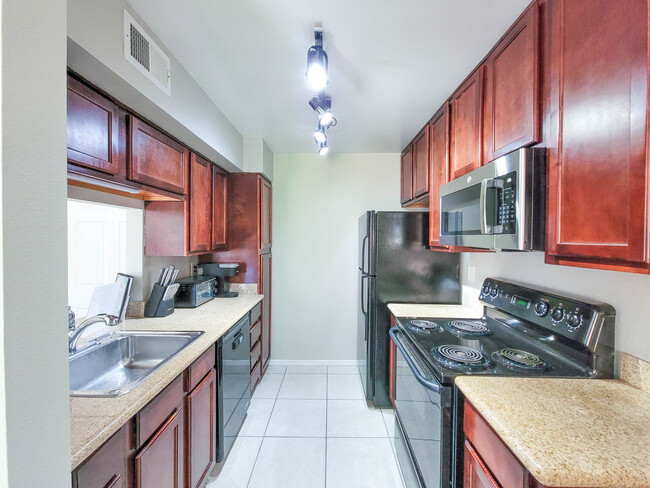 Fully-stocked kitchen ready for you to cook and enjoy meals in - 3500 N Hayden Rd