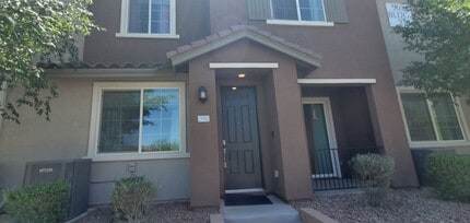 Building Photo - Beautiful townhome features a bright, open-concept layout