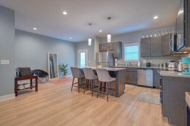 Building Photo - Spacious 4-Bedroom, 3-Story Townhome for Students