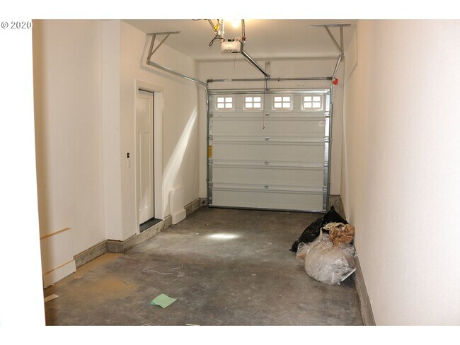 Building Photo - Modern 3-Bedroom Townhome-Style Home with Attached Garage, Private Patio & En-Suite Bathrooms in ...