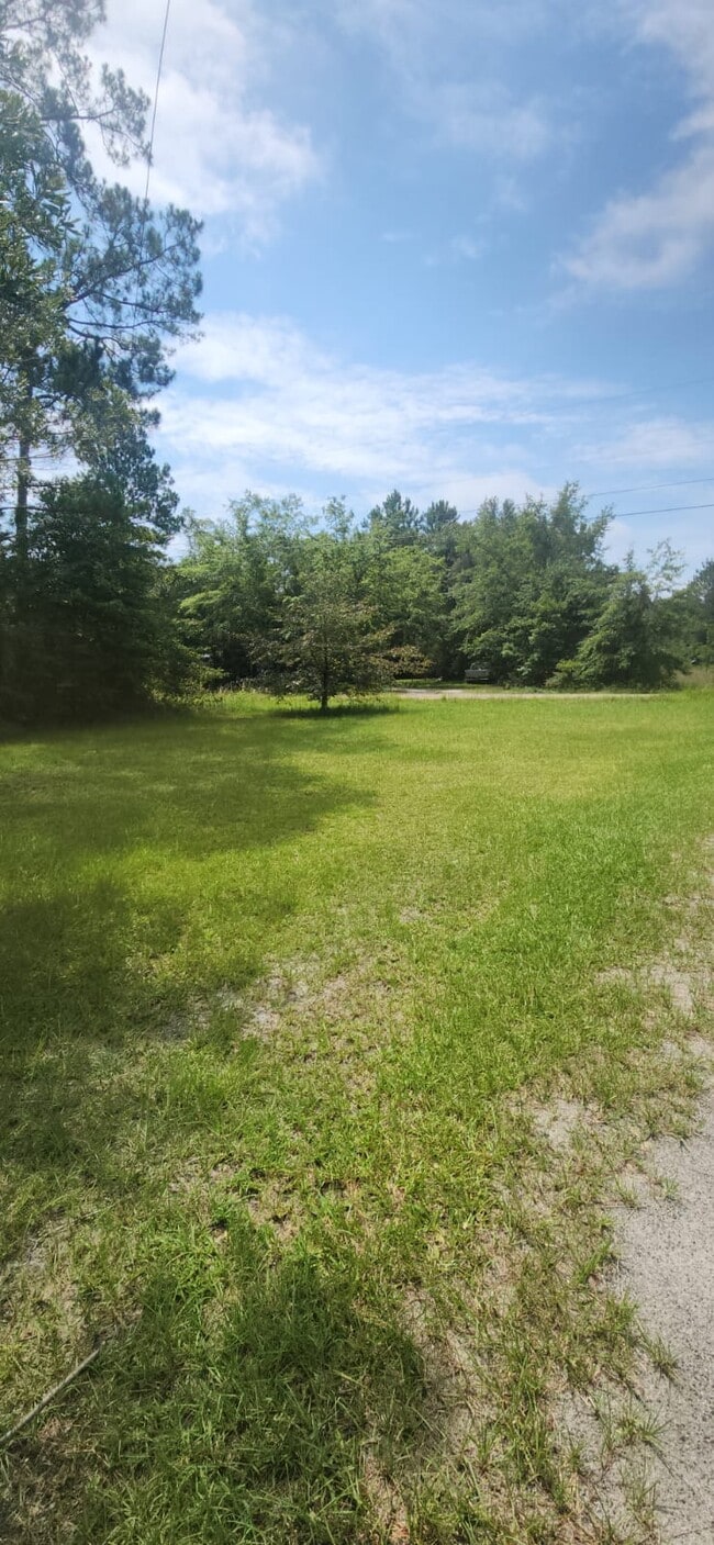 Building Photo - 19 Whispering Pines Cir