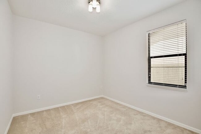 Building Photo - Stylish 4/3 Home with Covered Patio & Gara...