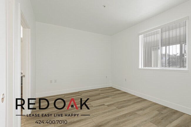 Building Photo - ~1 Month FREE~ Stunning Two Bedroom with a...