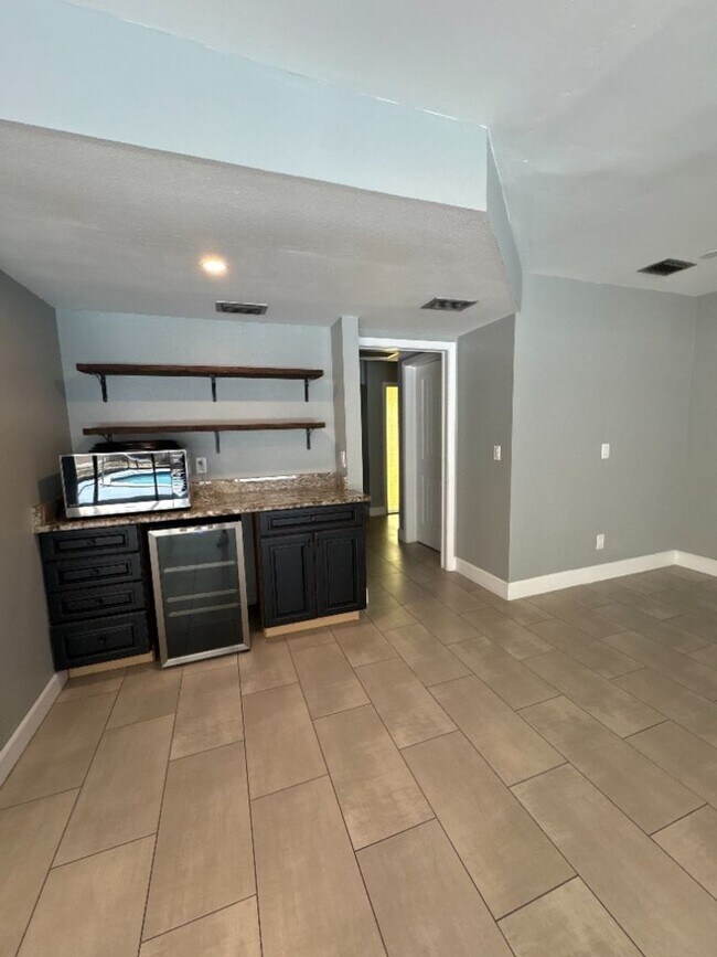 Building Photo - Stunning Custom Pool Home with Luxury Finishes!