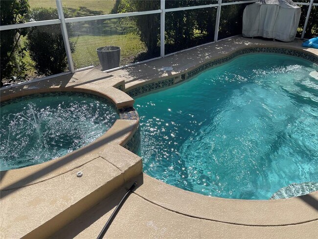 Building Photo - 10760 Plantation Bay Dr