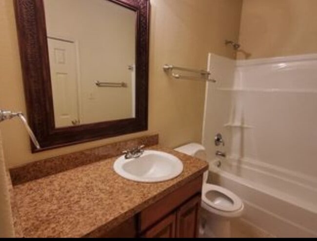 Building Photo - "Spacious 3-Bedroom Duplex Retreat in Gran...