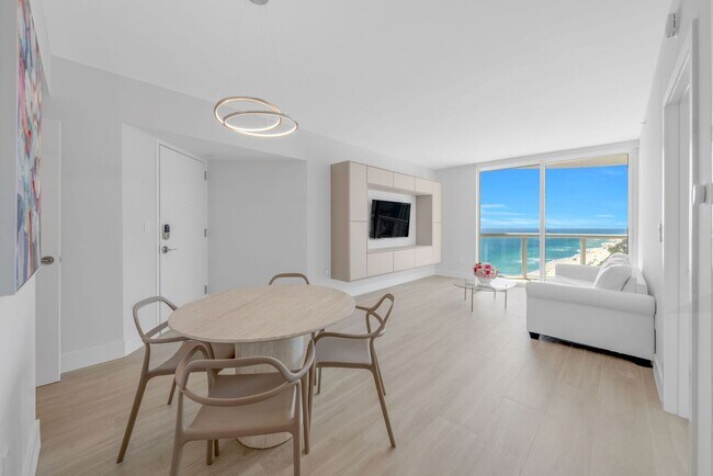 Building Photo - 6365 Collins Ave