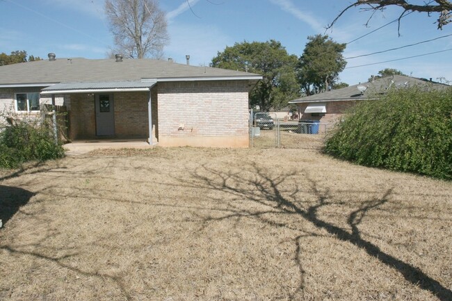 Backyard and back porch - 327 Briarwood Dr