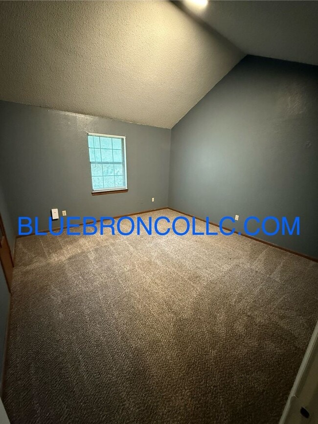Building Photo - New flooring and fresh paint in this spaci...