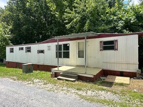 Building Photo - Updated single wide. Water/lawn care inclu...