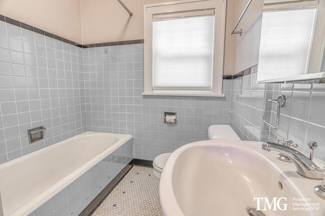 Building Photo - Updated 1928 Tutor w/ Original Touches and Large Fully Fenced Back Yard