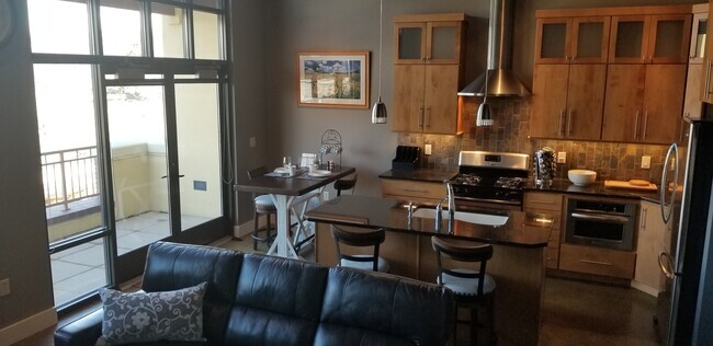 Dining Area and Balcony View Bown Crossing - 3066 S Bown Way