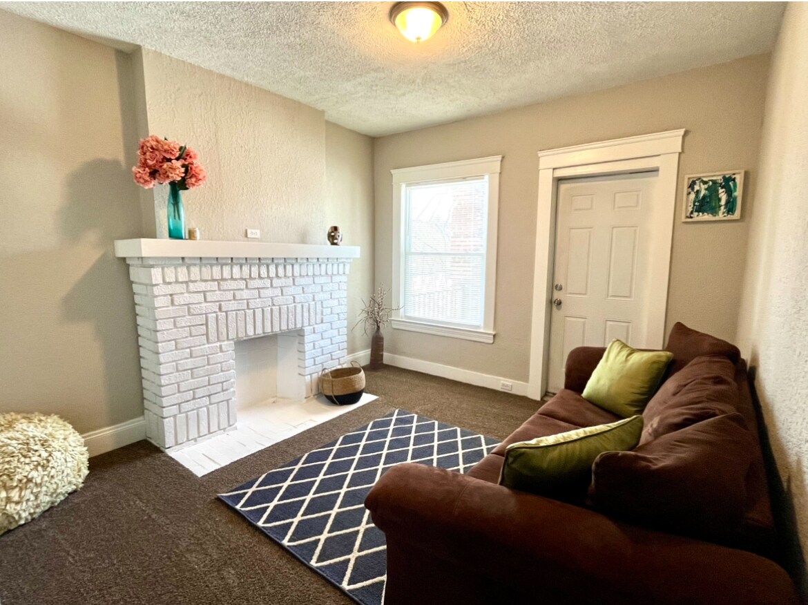 Bright, clean, and ready to feel like home. - 603 E 109th St