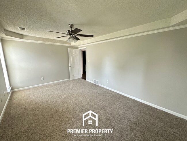 Building Photo - Charming 3BR/2BA Near Southwind | High Vaulted Ceilings, Hardwood Floors & Fireplace