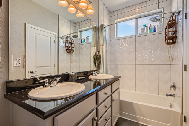 Third floor primary bathroom with walk in closet - 4280 E Warren Ave