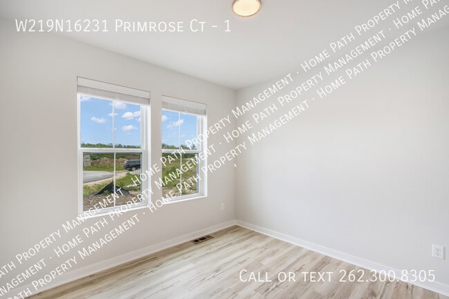 Building Photo - W219N16231 Primrose Ct