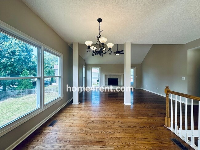 Building Photo - Brand New Paint, Wood Floors, Walkout Fini...