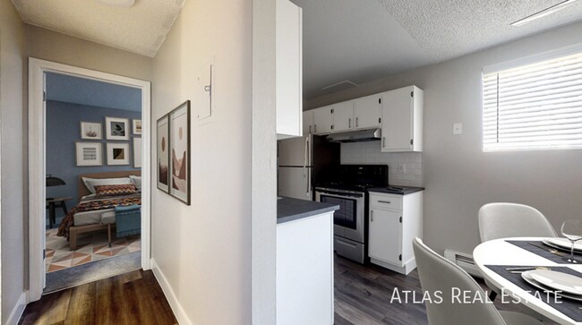 Building Photo - 7155-103 N Raleigh Street-103