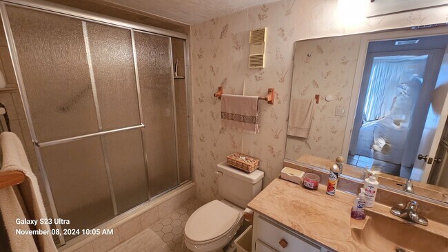 Building Photo - Furnished 3rd Floor Condo Overlooking The Golf Course