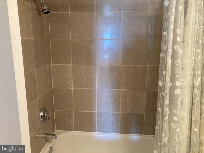 Building Photo - 7500 Woodmont Ave