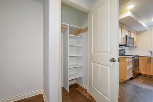 Hall/coat closet w/custom adjustable built-ins. - 6315 NE 36th Ave