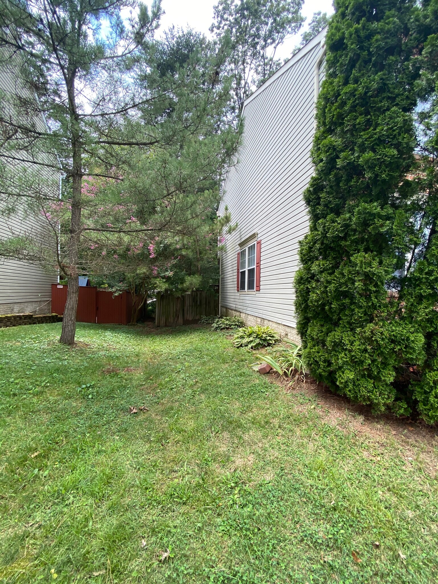 Side of home - 7812 Foxfarm Ln