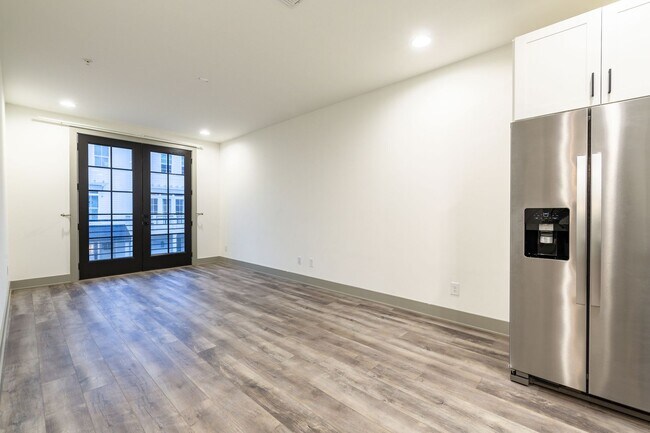 Building Photo - Modern Living Meets Walkable City Charm in...