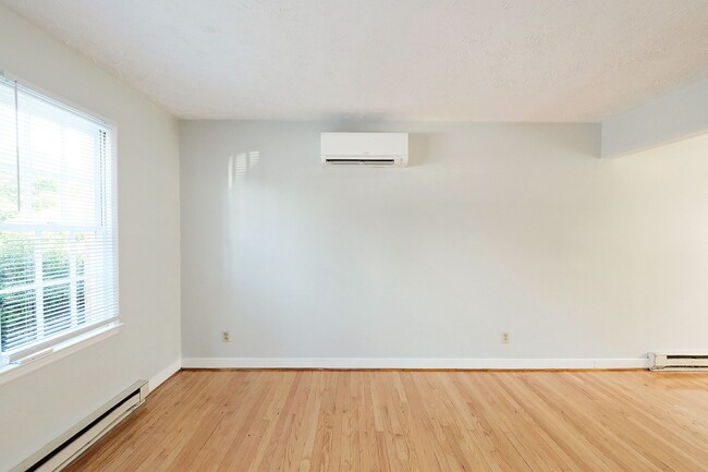 Building Photo - Small Dog-Friendly Woolen Mills Duplex Near Downtown