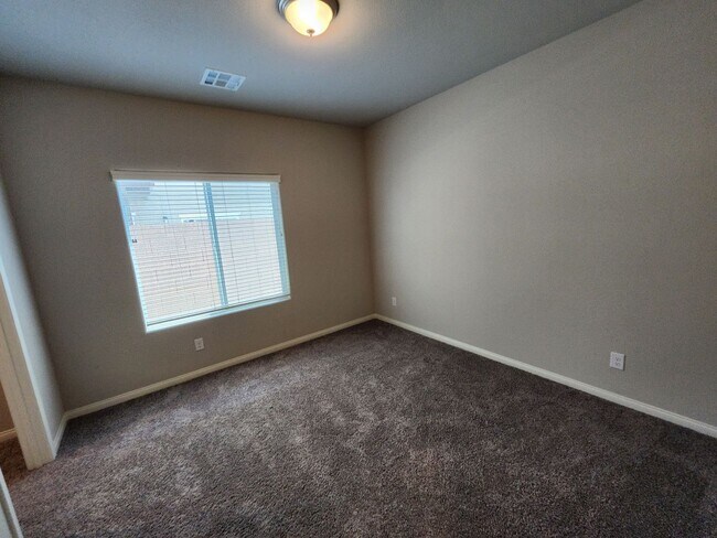 Building Photo - A Fairly New Home with 5 Bedrooms in a gated community