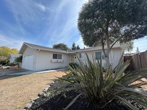 Building Photo - Spacious 1,196 Square Foot  4BR Home Across from Technology High School | Large Yard & 2-Car Garage"