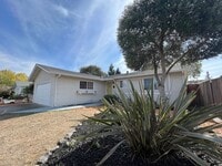Building Photo - Spacious 1,196 Square Foot  4BR Home Across from Technology High School | Large Yard & 2-Car Garage"