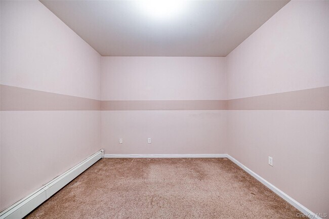 Building Photo - 62-21 Almeda Ave