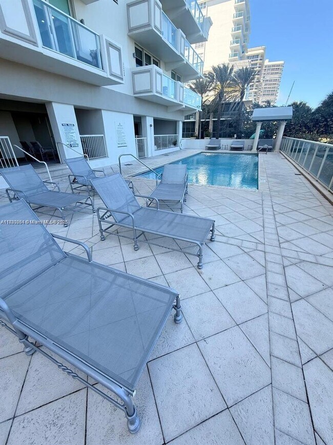Building Photo - 9499 Collins Ave