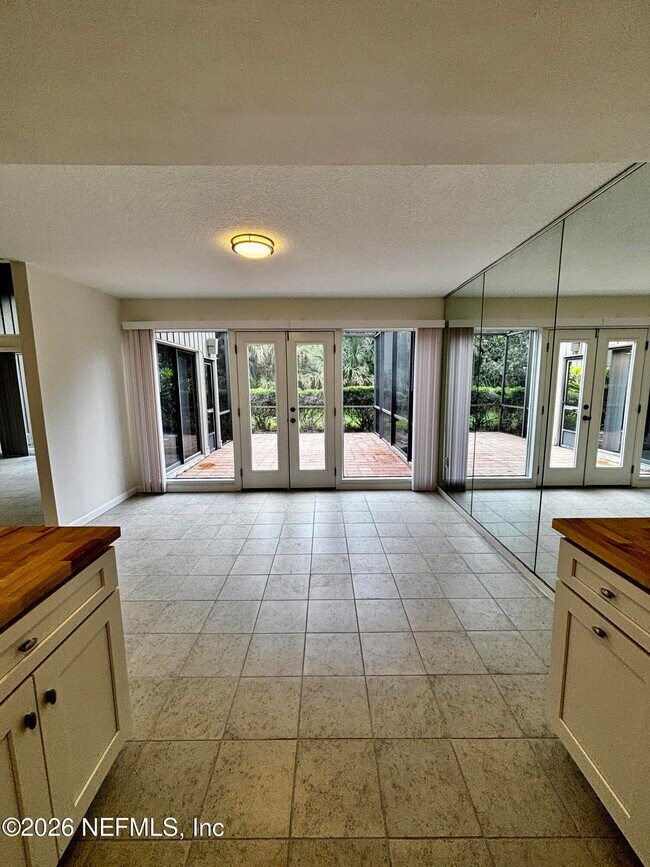 Building Photo - 9787 Sawgrass Dr E