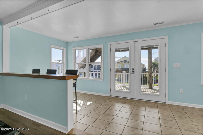 Building Photo - 1207 N Topsail Dr