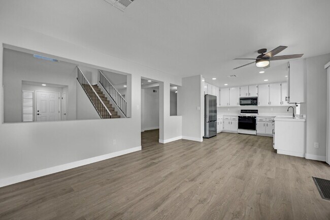 Building Photo - Step into this charming 3-bedroom, 3-bathroom home that has so much to offer!