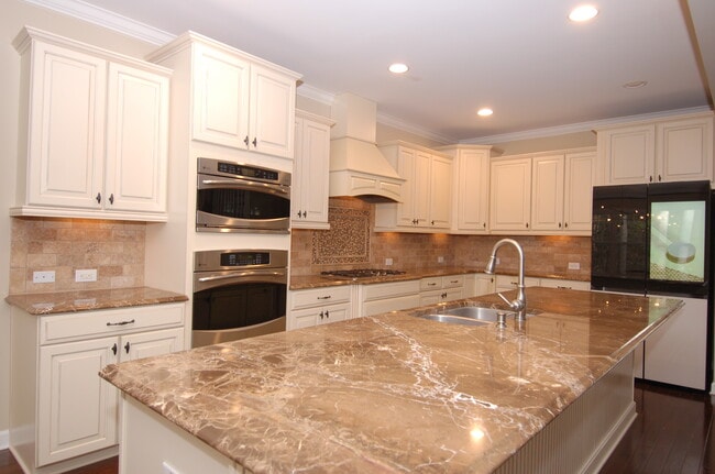 Kitchen with huge marble island - 4832 Millens Bay Ct