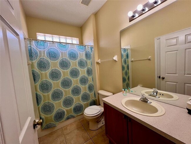Building Photo - 8127 Fan Palm Way