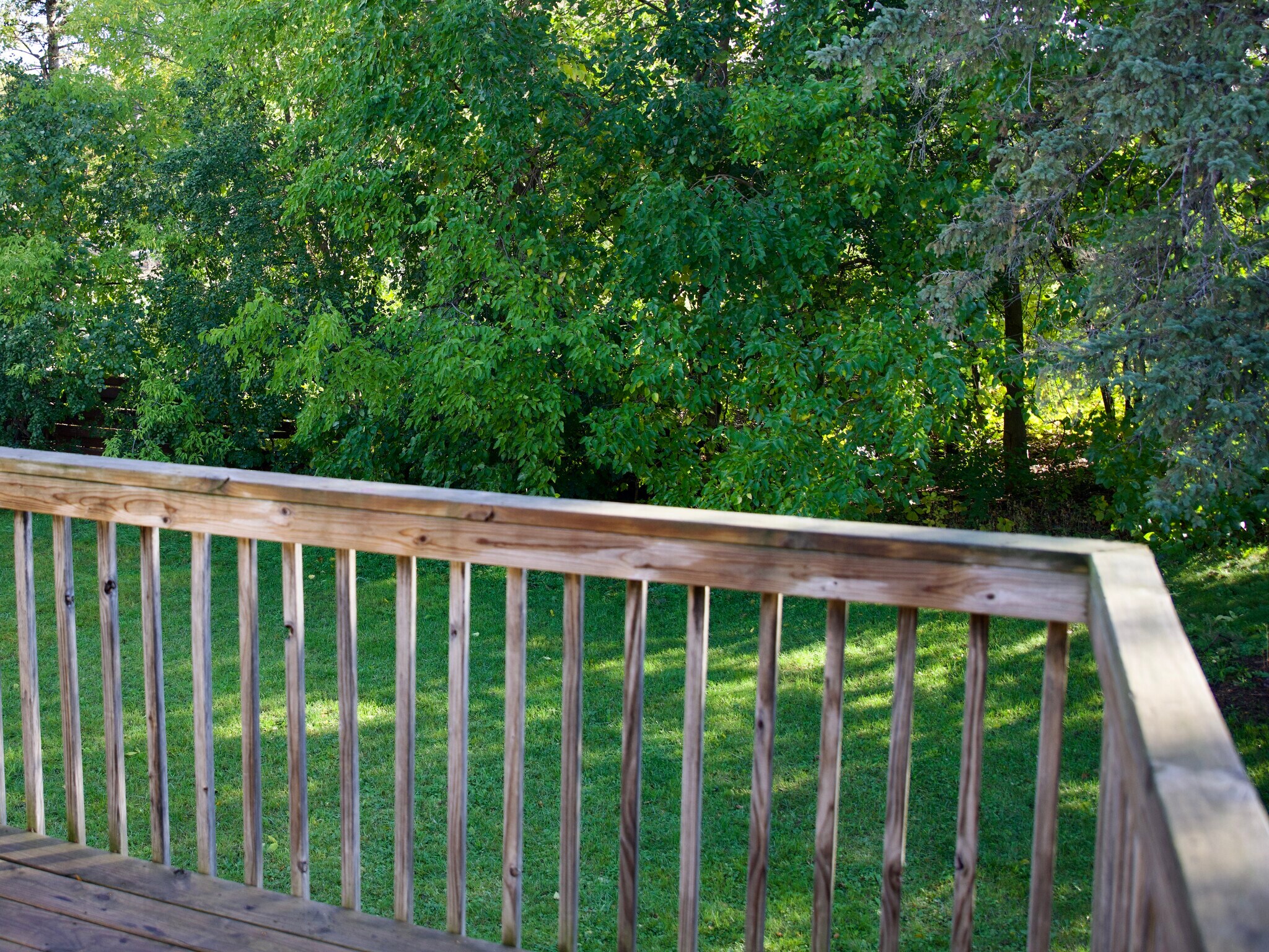 Deck off of dining room. - 8016 Zane Ave N