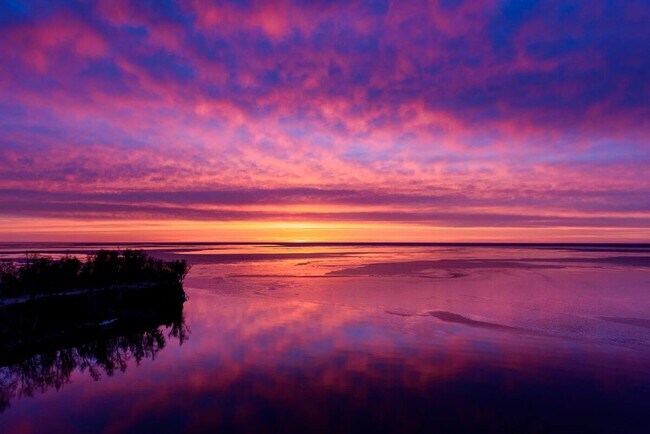 The sunrises over the lake are incredible (taken from the property) - 6012 Highway 61